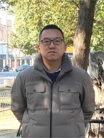 张德新